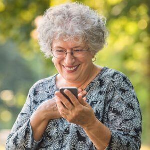 senior woman checking phone