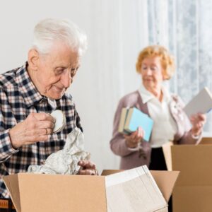 elderly couple, moving boxes