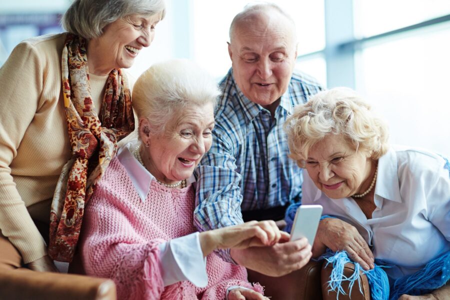 seniors looking at phone