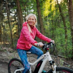 senior woman biking