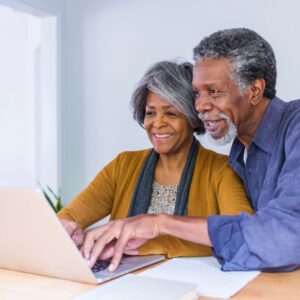 senior couple using computer