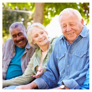 Seniors sitting together on a bench