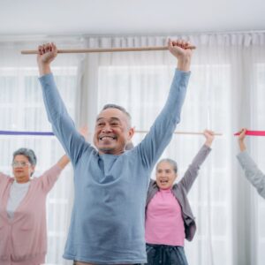 happy seniors in exercise class