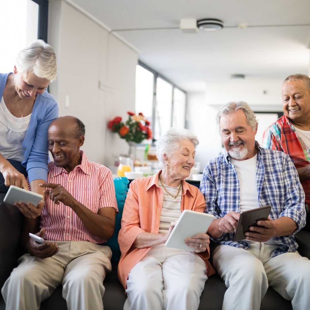 a group of people smiling and laughing